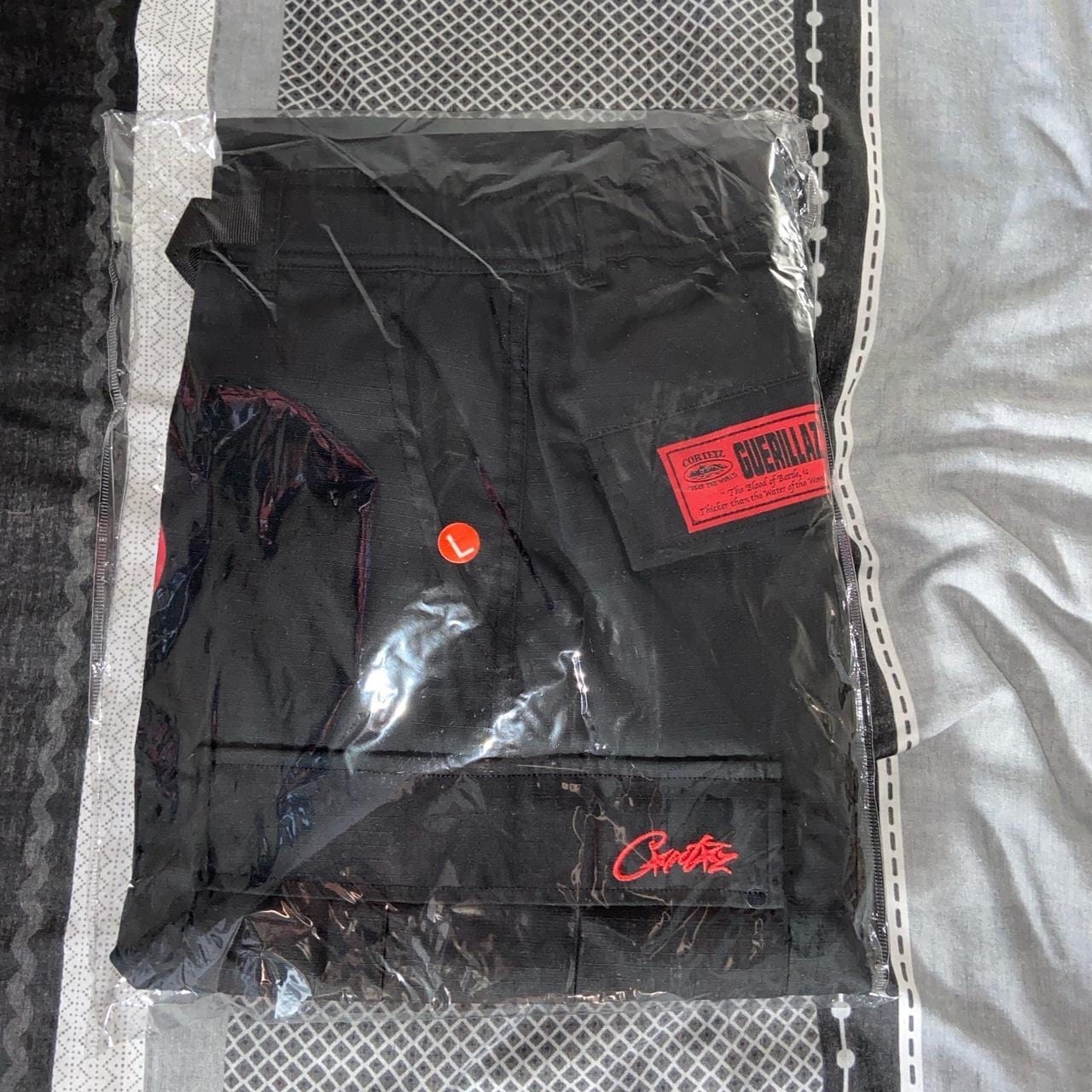 Corteiz black n with red logo cargos