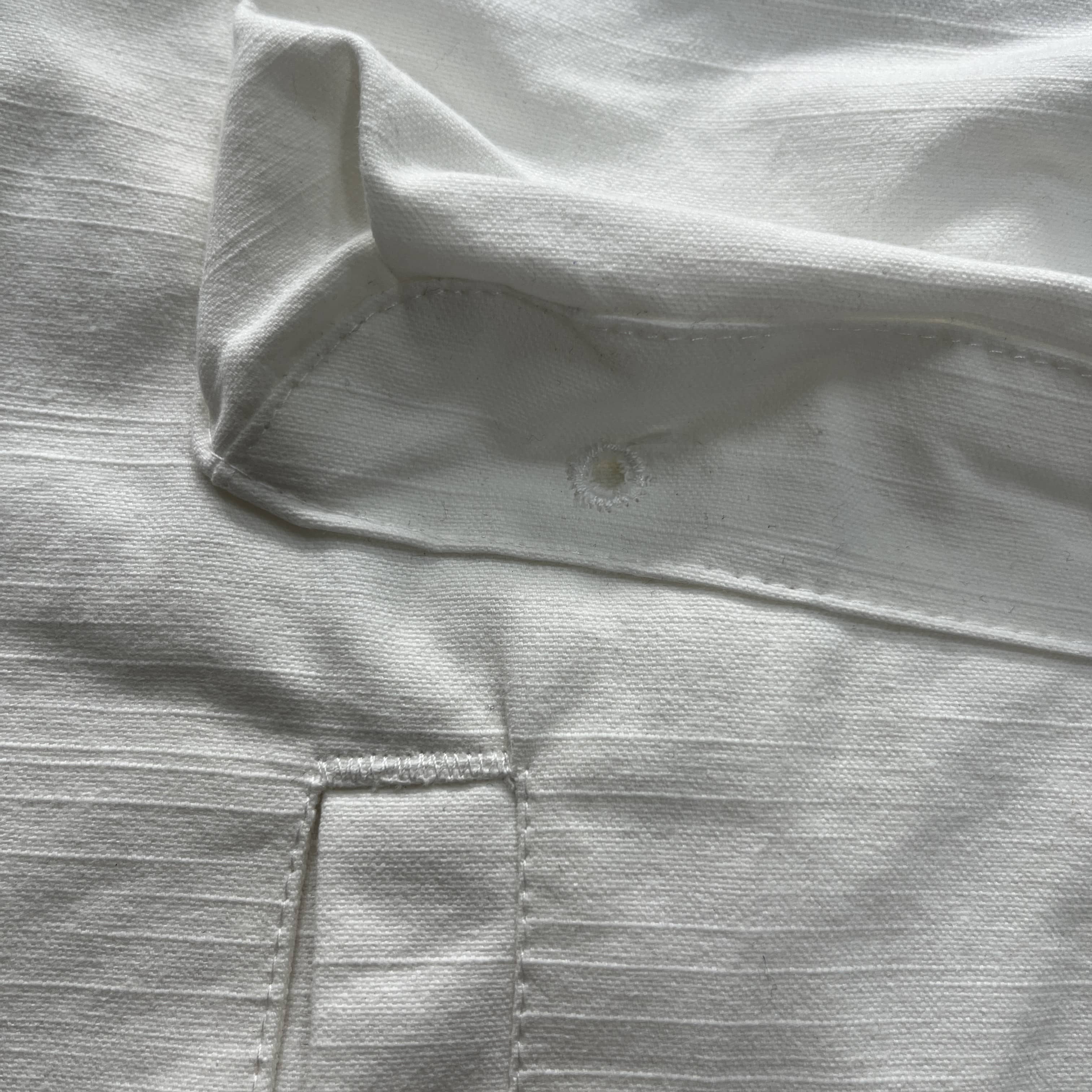 Slant pocket white jacket