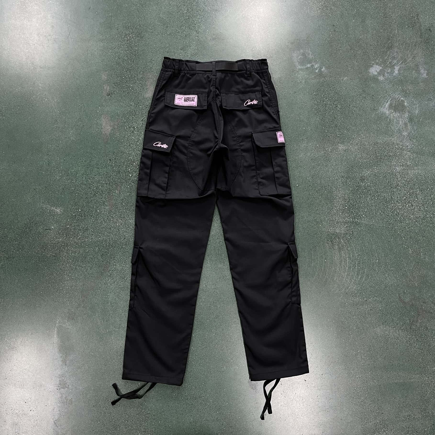 black with pink logo cargos